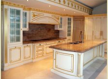Elaborately hand carved Halliday's kitchen with painted and gilded finish